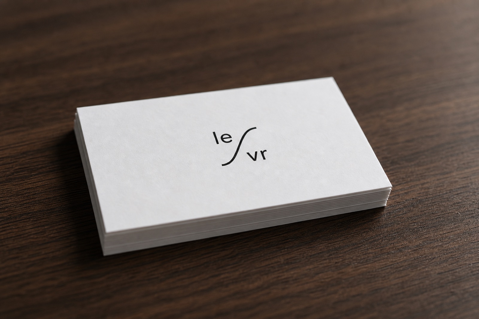 LEVR business cards, black ink on white stock.